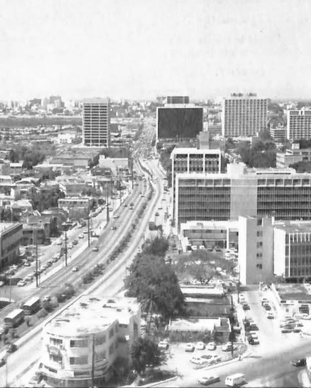 Aerial view of Hato Rey and the Golden Mile in 1970, looking down the expressway past new bank towers